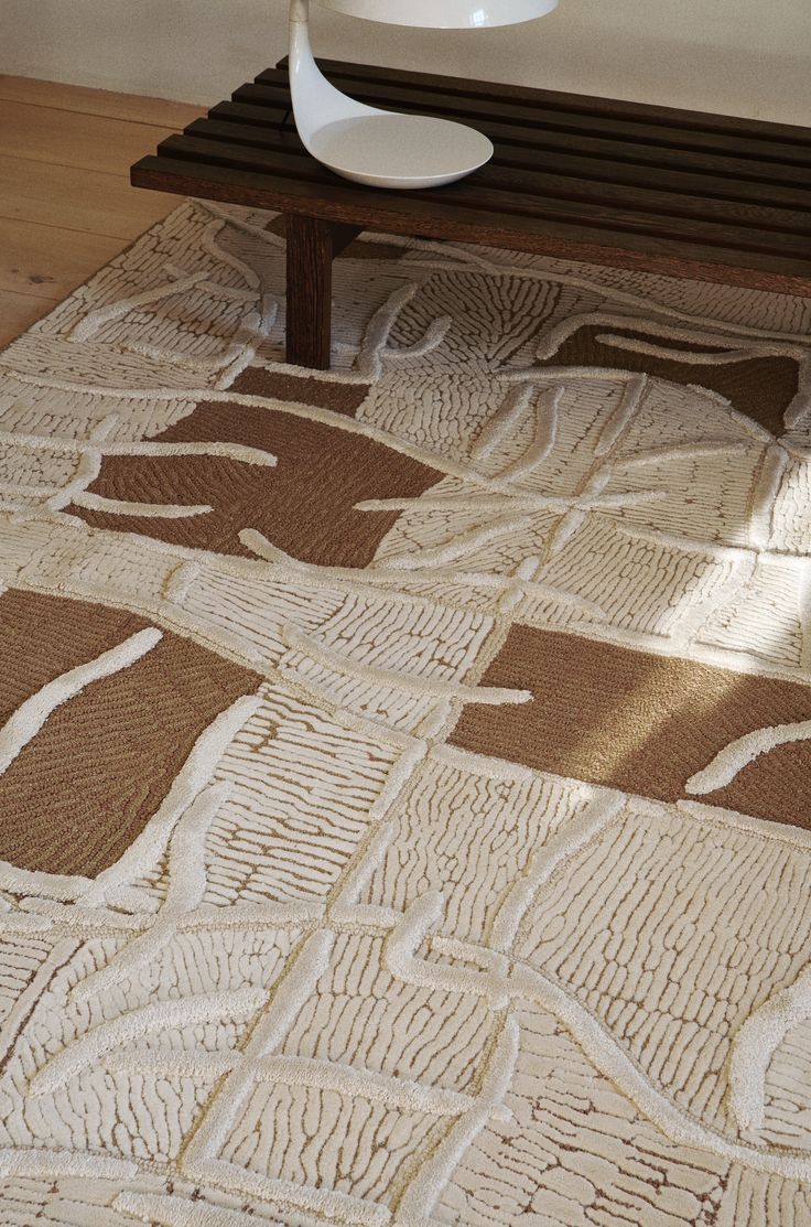 米棕调肌理地毯：曲线线条与块状拼接的舒缓设计